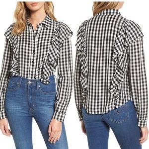 Gingham ruffle shirt.